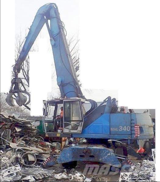 FUCHS MHL 340 - stroje pro manipulaci s odpadem